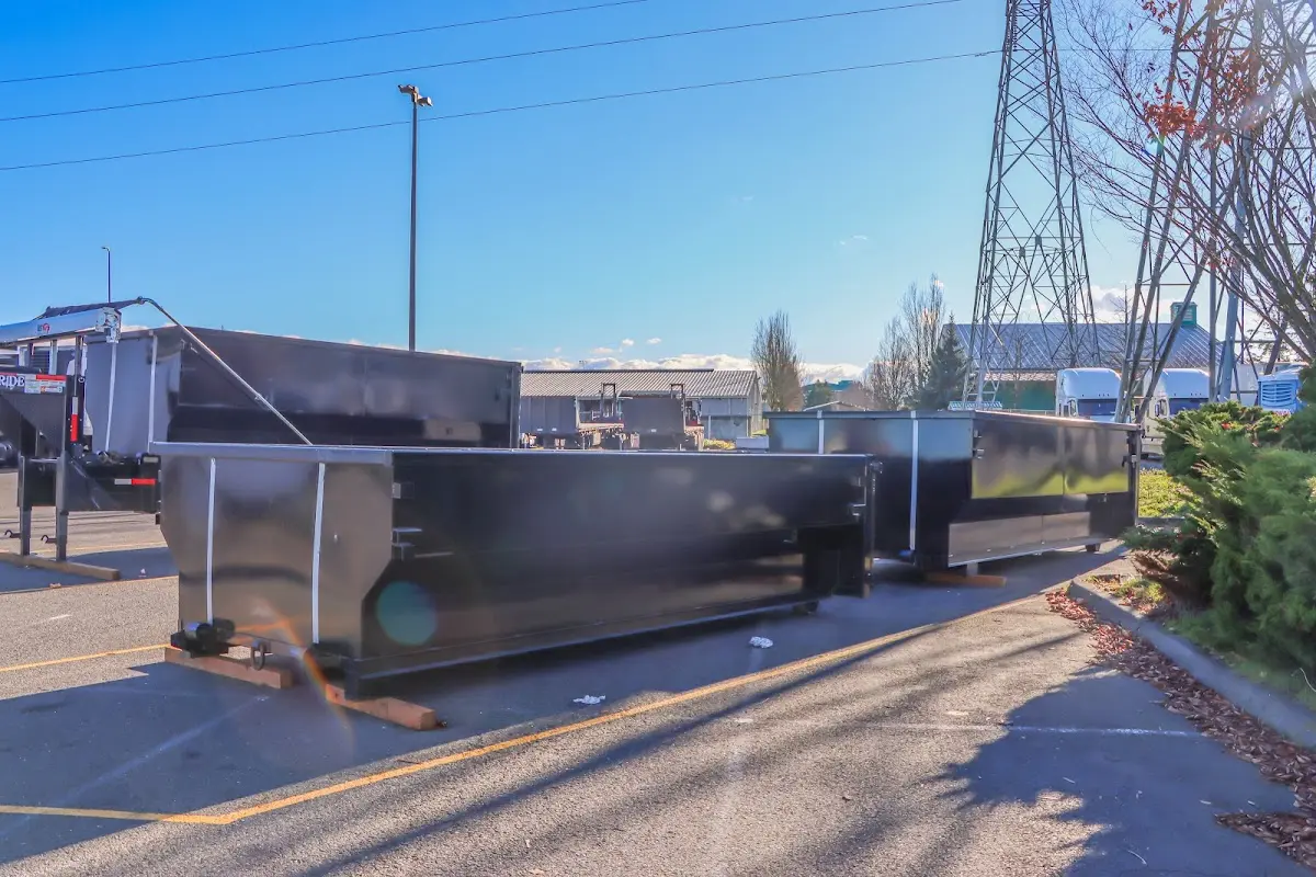 Roll-off dumpster ready for waste disposal at job site for Demolition Dumpster Rental in Lake Station